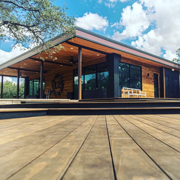 Exterior view of 12 Fires tasting room with wood deck