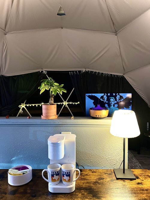 Appliances on countertop inside dome